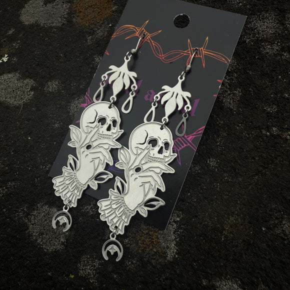 Hands of fate dangles